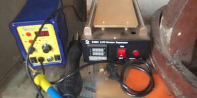 A picture of A phone repair blower machine and a screen separator