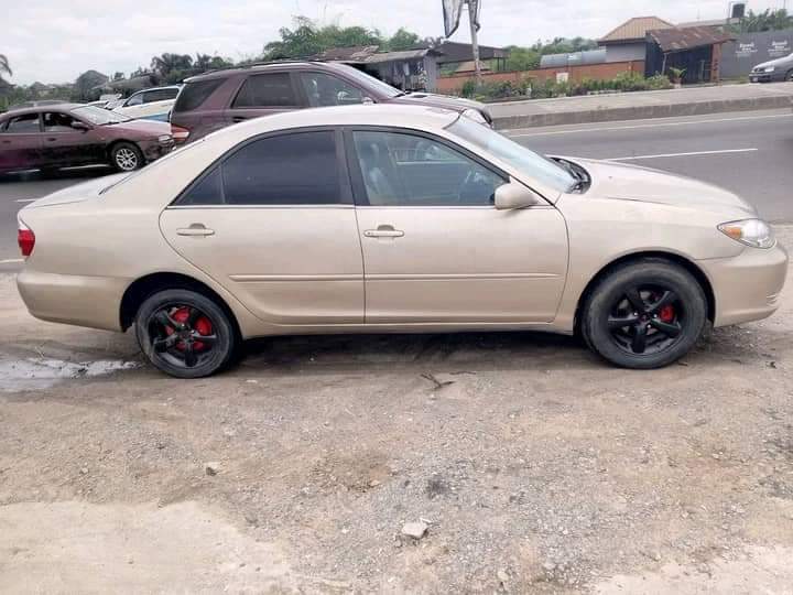 A picture of 2004 big daddy Camry Buy and drive Sharp engine and