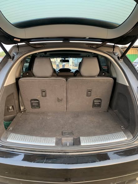 A picture of 9 months used Acura MDX 2015 modelTokunbo standard Fullest option
