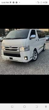 A picture of Toyota Hiace Hummer Buss. 2014.