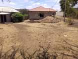 A picture of Kiwanja kimenyooka kinauzwa barabara ya east africa road
