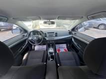 A picture of Mitsubishi Lancer 2010 model First body Price 2 750M Location