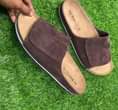 A picture of Male and female slippers and shoes