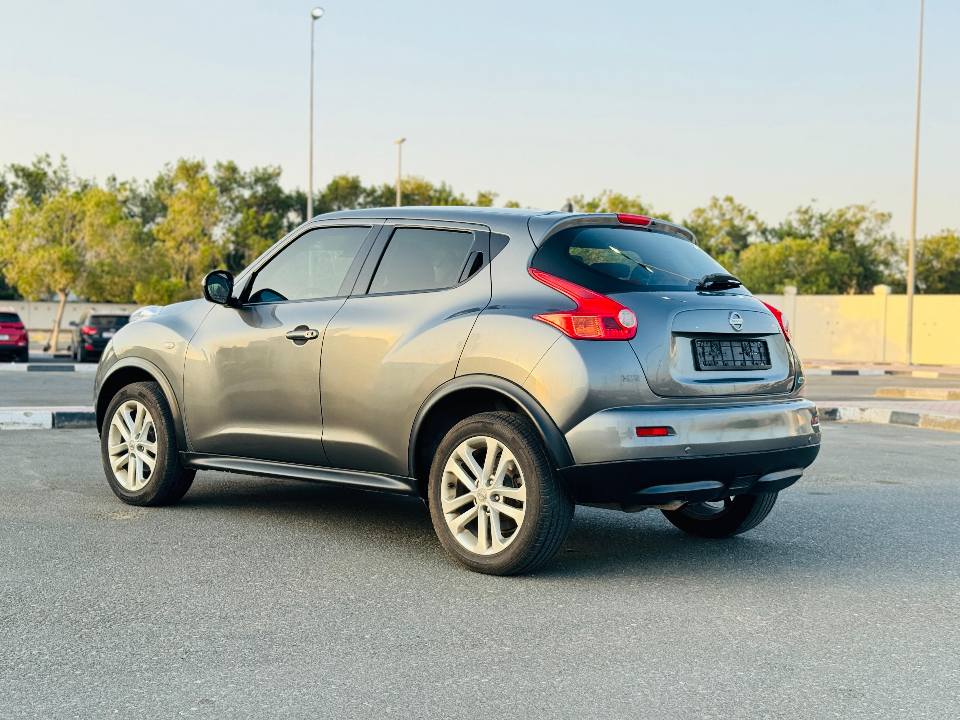 A picture of Nissan juke model 2014 gcc v4 cylinder watsapp 971551513562