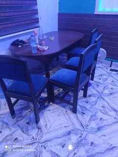 A picture of Dining Table with chair 