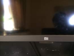 A picture of ITEM 32 INCH REDIMI 2024 SMART TV CONDITION USED PROPERLY