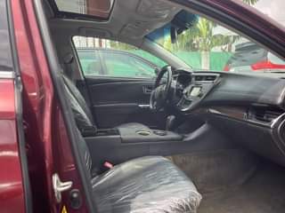 A picture of Model Avalon XLE Year 2013 Features barely driven Foreign with