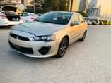 A picture of 0563289778 Mitsubishi Lancer mid option for sale bank auto loan