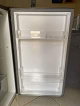 A picture of Hisense fridge 120 litres