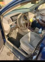 A picture of Dealers Deal 04 corrola painted with sound engine n gear