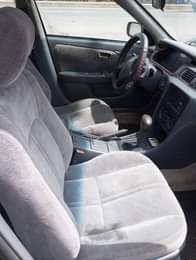 A picture of Toyota Camry tiny light Sound engine AC needs gas Gear
