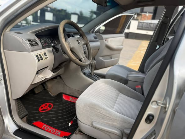 A picture of 2006 toyota Corolla engine and gear sweet interior AC freezing
