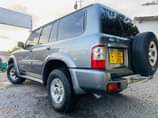 A picture of Price Bei38 5mil Call 0658056651 Nissan Patrol Grey In Colour