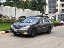 A picture of TOYOTA CAMRY XLE 2006 TOKUNBO STANDARD FORMICA CLEAN LETHER SEAT