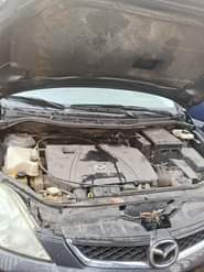 A picture of 3 seater Mazda Engine is sound Gearbox sound Interior very