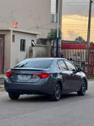 A picture of TOYOTA COROLLA LE 2014 UPGRADE TO 2017 MODEL LOCATION KADUNA