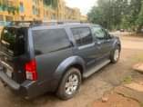 A picture of NISSAN PATHFINDER WITH A GOOD ENGINE AND GOOD GEAR GEAR