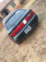 A picture of Mazda 323f Working fine with little smoking Price 630k Location