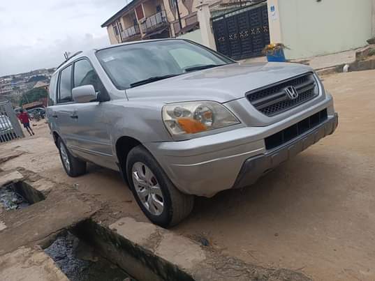 A picture of Toks standard registered 2005 Model Honda Pilot Super clean in