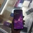 A picture of Pink screen samaung s9plus 64gb 6gbram At 200k Call 0788400877