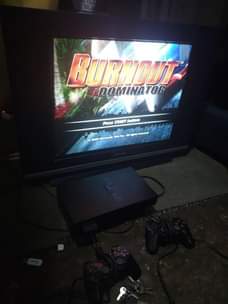 A picture of PS2 FULLSET with 5games and 29 inchez Hisense kibuto tv