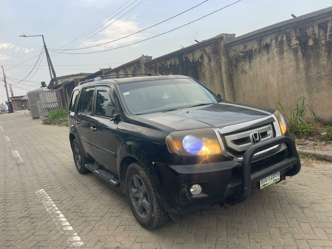 A picture of Honda Pilot 2011 Registered 5.7m first body pan at Ogba
