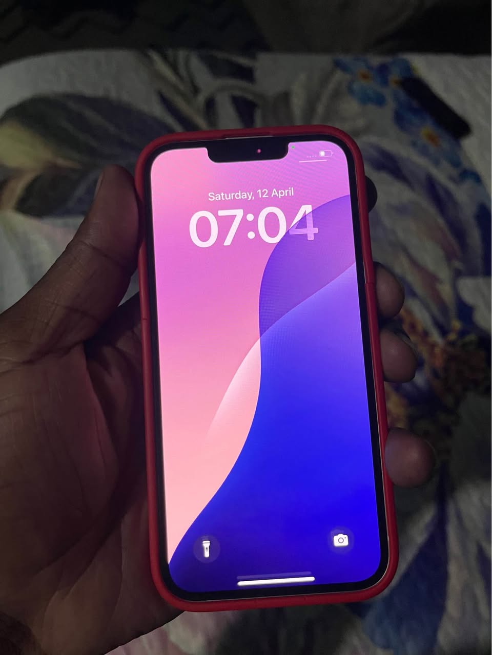 A picture of iPhone 13 normal 128gig battery 100 all network