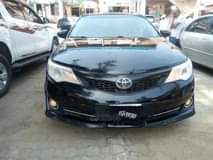 A picture of A very clean 2013 Camry with first body zero repaires