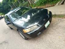 A picture of Distress 2000 Toyota Camry pencil light good body interior engine