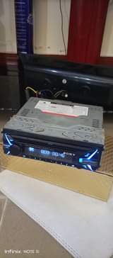 A picture of Radio ya GARI sony Battery ya Canon OG