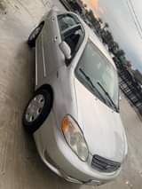 A picture of Toyota Corolla 2004 le first body gear and AC intact