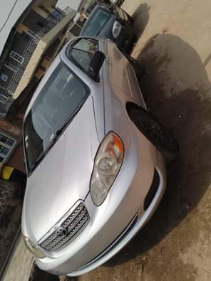 A picture of Registered 04 Toyota corolla painted on first body engine and