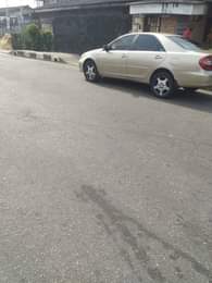 A picture of Toyota Camry Big daddy Color Gold Model 2003 Neatly Nigeria