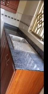 A picture of Marbles and granite slabs