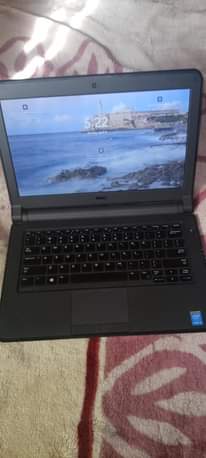 A picture of DELL latitude i5 and 5th generation at 650 000