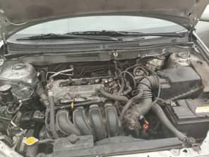 A picture of Toyota Corolla 2004 Engine has ajuster noise AC chilling Gear