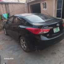 A picture of Cash needed urgently for this 2012 Hyundai Elantra painted once