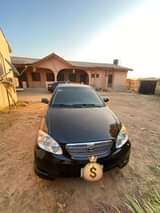 A picture of Super Sharp registered 04 Toyota Corolla sports first body untempered