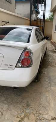 A picture of Awoof deal super clean registered Nissan Altima 2008 model going