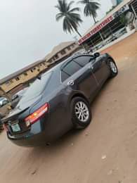 A picture of IN GOD WE TRUST Super clean highest grade Toyota spider