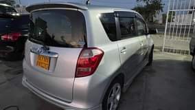 A picture of WhatsApp call 255 762 483 424 Toyota ractis Colour sliver