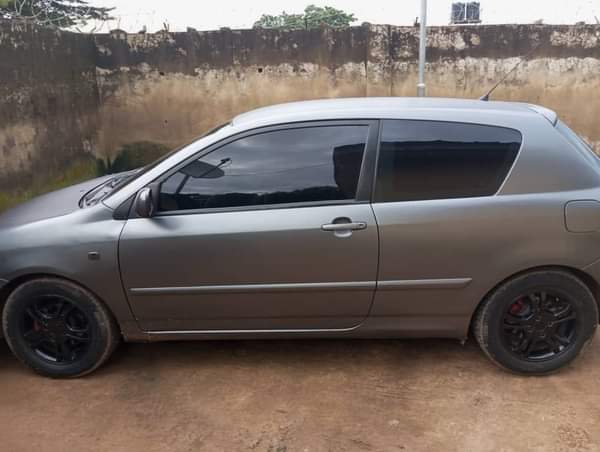 A picture of Toyota Corolla Obama pimped sport with flying doors located in