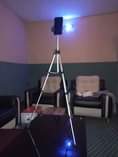 A picture of Tripod with extra 2 lens and Bluetooth device
