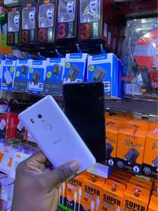 A picture of SHARP AQOUS FO2L PRICE 185000 Ugx Free charger Screen Guard