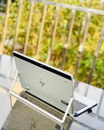 A picture of Laptops and camera
