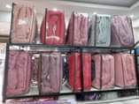 A picture of 3pc woolen blankets 2 pillow cases 1 blanket Sizes 4