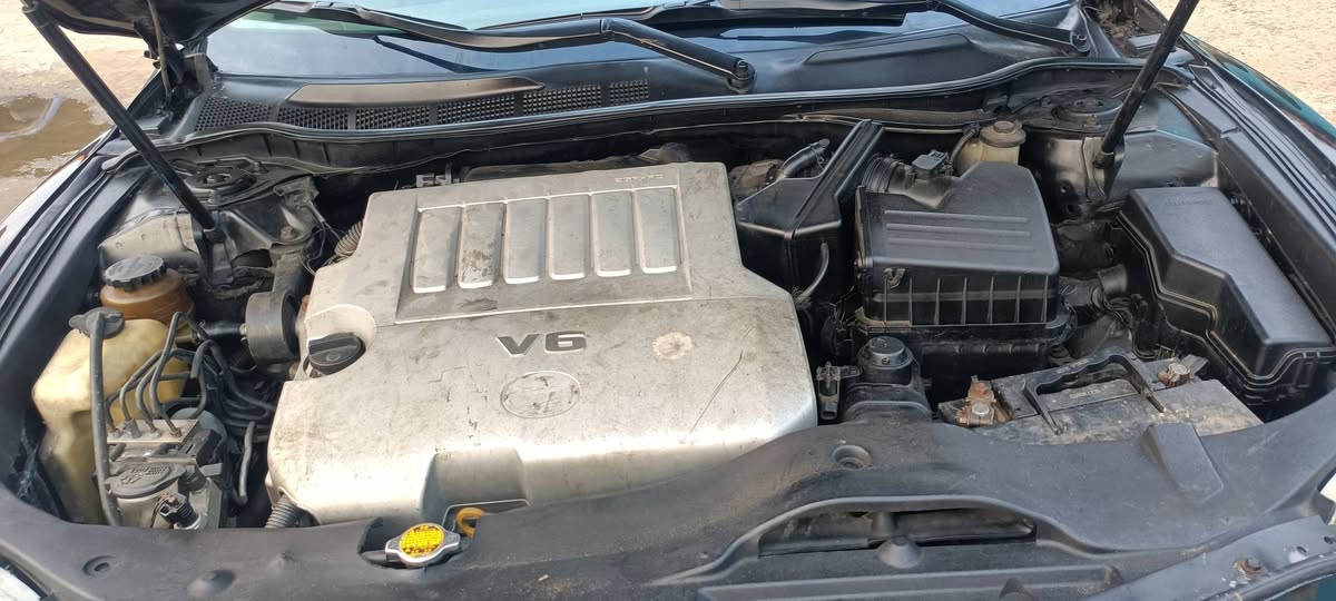 A picture of TOYOTA CAMRY XLE 010 WITH TOM STATR EVERYTHING OK ENGINE