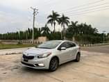A picture of NEATLY USED 2014 KIA CEREATO WITH DUTY AND COMPLETE PAPERS