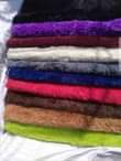 A picture of Fluffy bedside carpets available in different colors and designs Medium