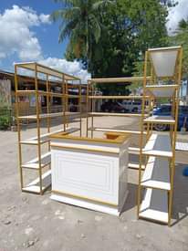 A picture of Nauza shelf za dukan zipo 3 na counter Bei 1